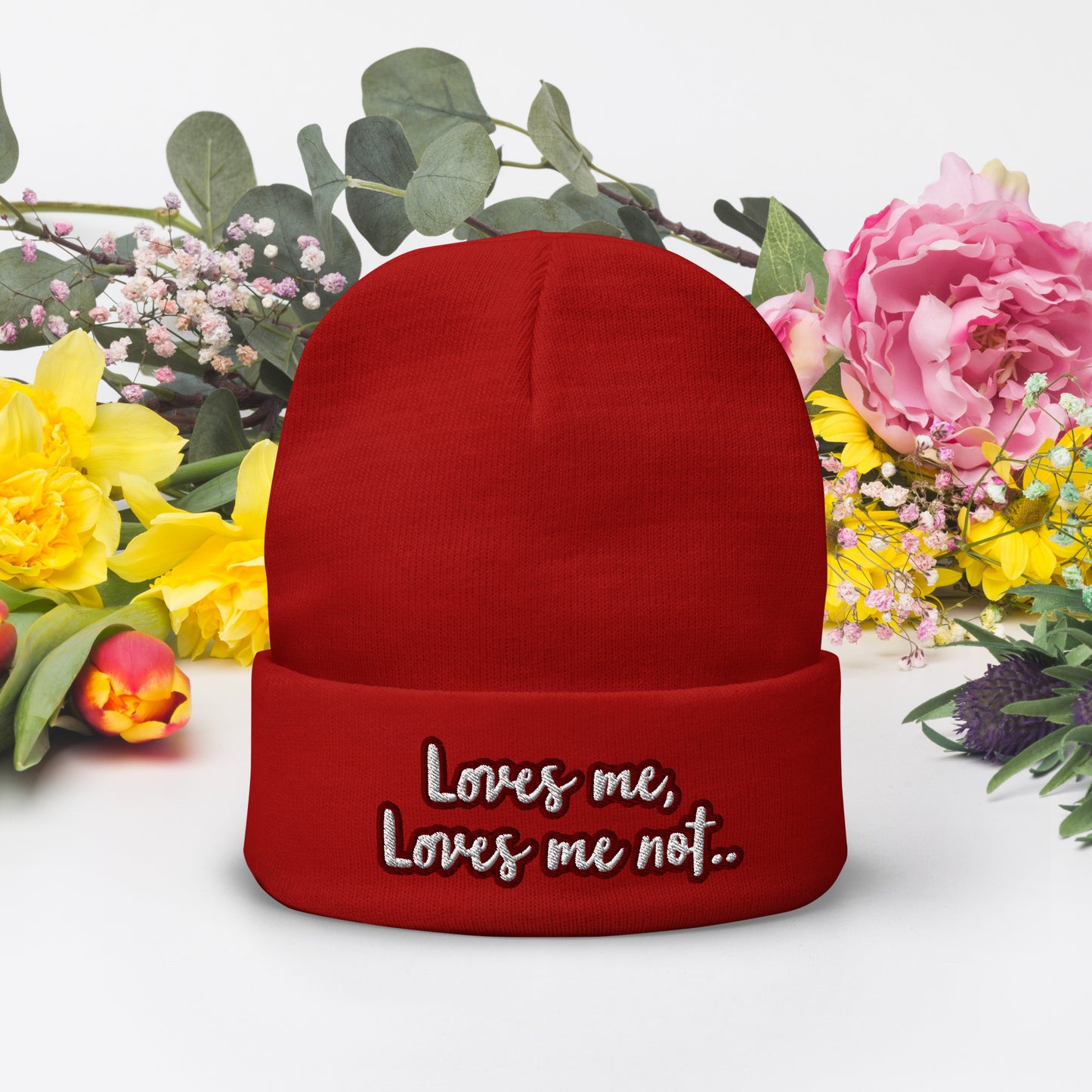 Loves me, loves me not by Irma Embroidered Beanie