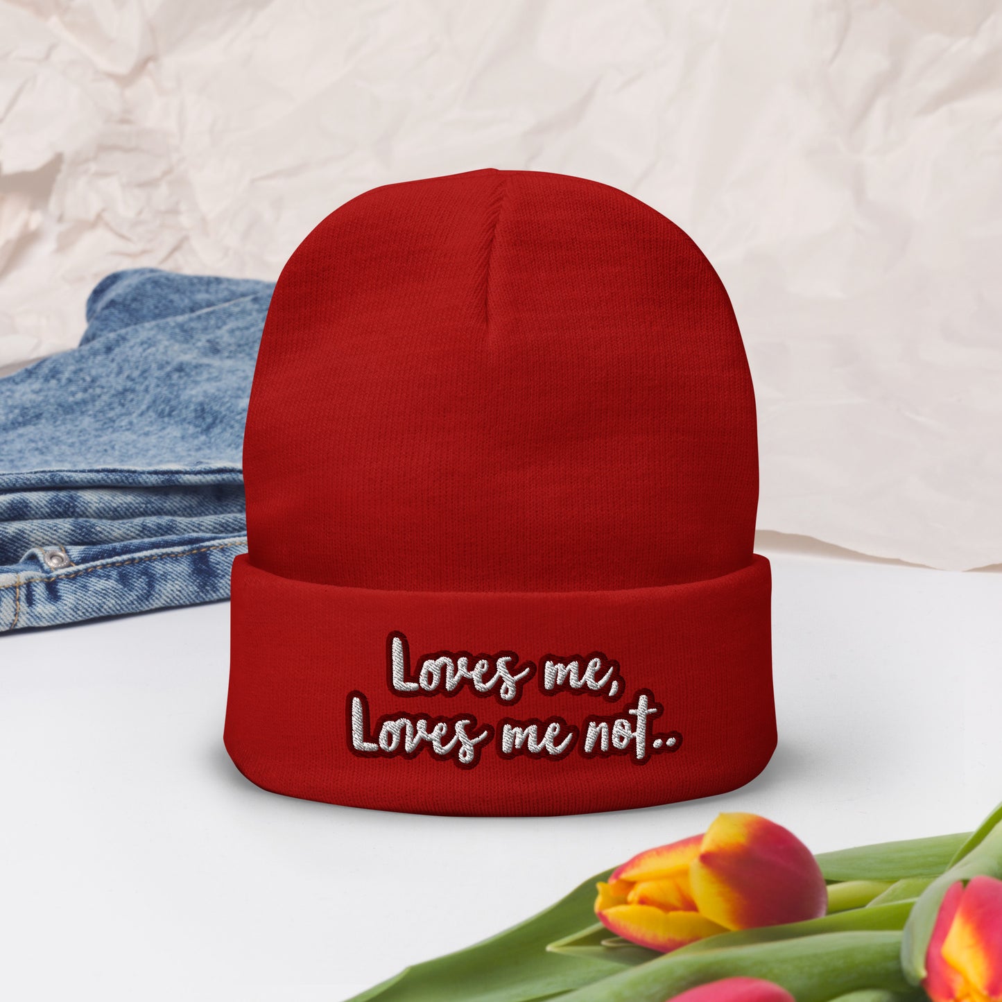 Loves me, loves me not by Irma Embroidered Beanie